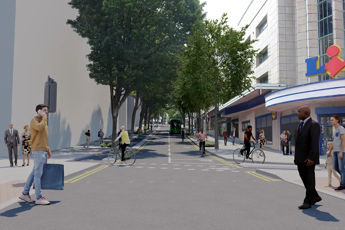 a graphic showing people crossing Union Street, with a separate crossing for cyclists that leads to a separated cycle track up Union Street.